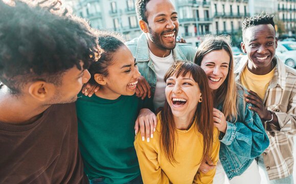 Friends laughing together outdoors